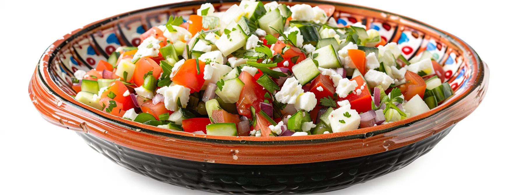Colorful bowl of fresh salsa salad with tomatoes, cucumbers, green peppers, red onions, feta cheese, and herbs, emphasizing healthy eating for weight loss and nutrition.