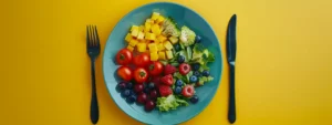a colorful, vibrant plate filled with a variety of fresh fruits and vegetables, symbolizing a personalized online diet plan tailored for weight loss.